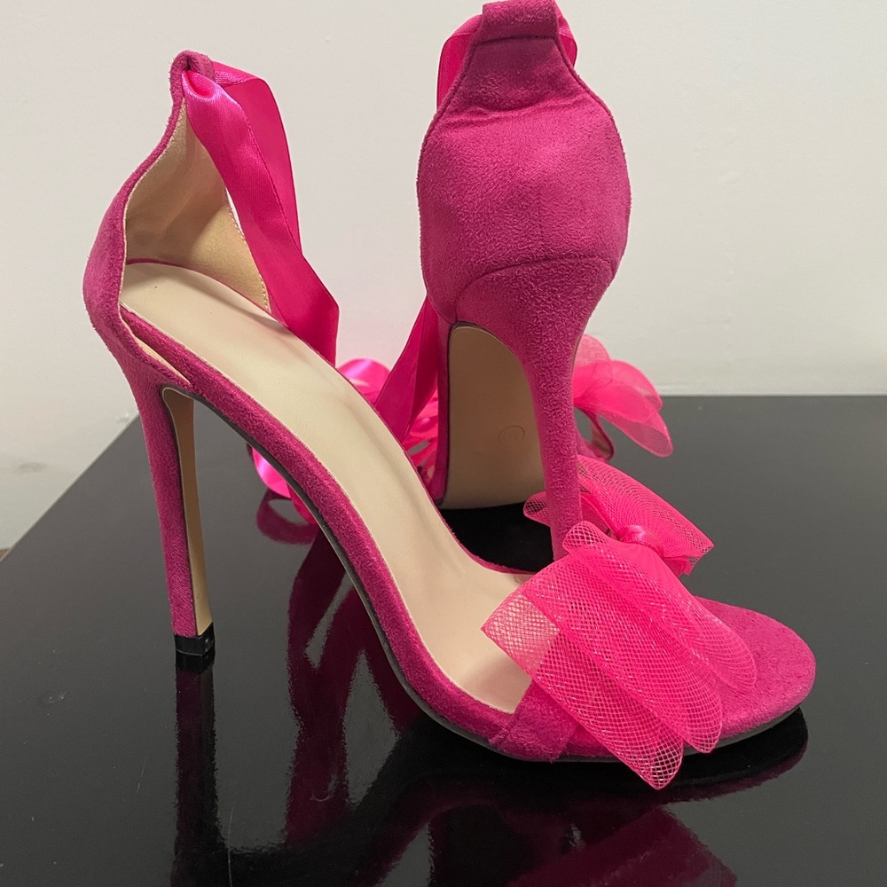 Ribbon Ankle-Wrap Stiletto Sandals
Size 40 fits a US 9